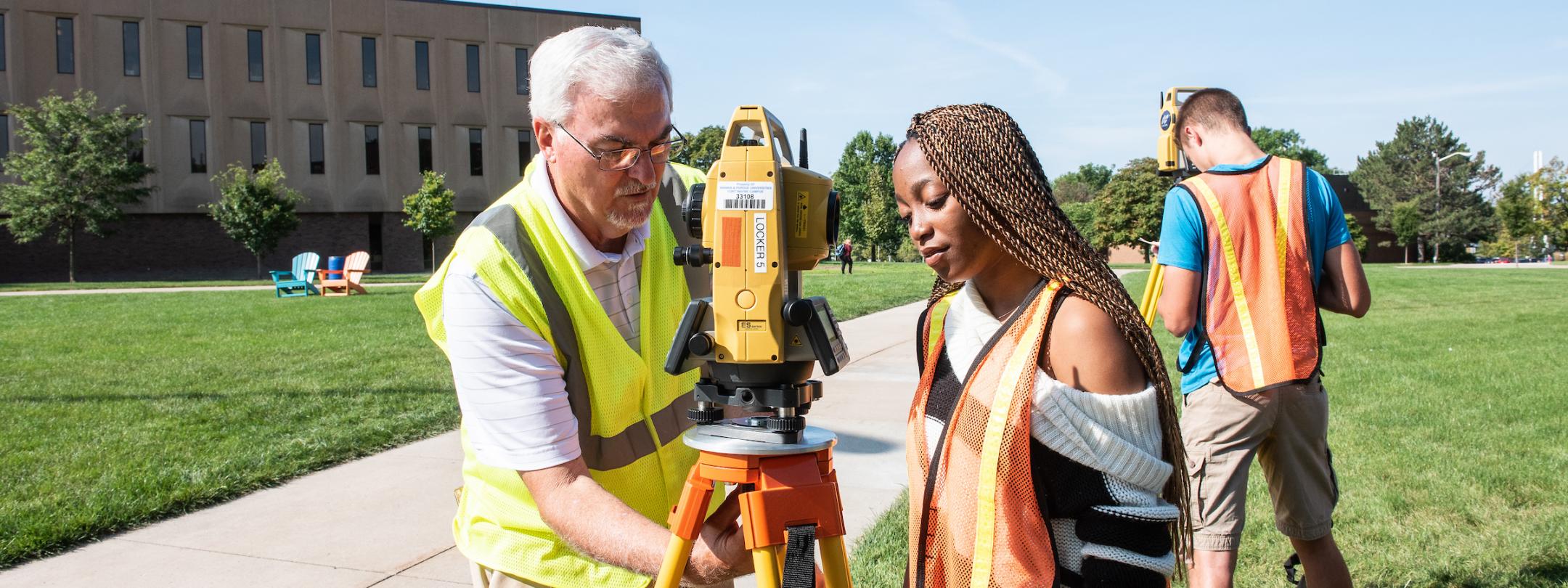 Student and professor surveying