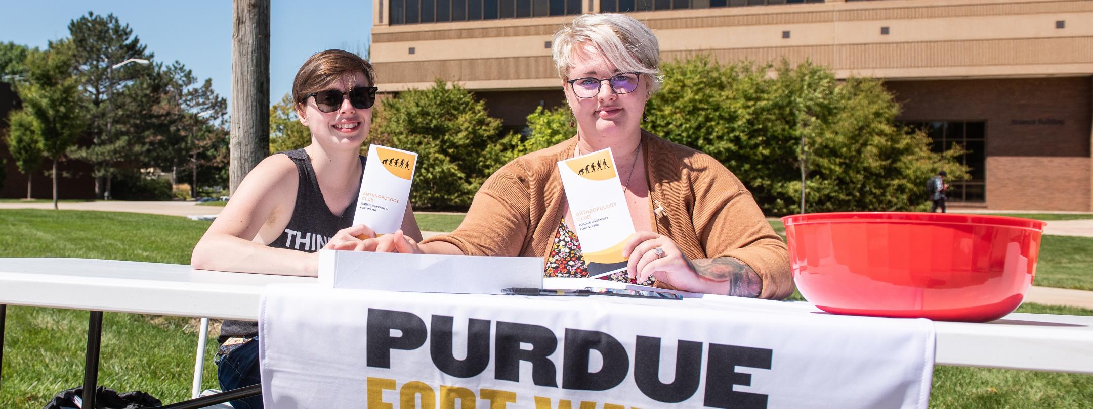 Students at the Anthropology Club table during welcome week.