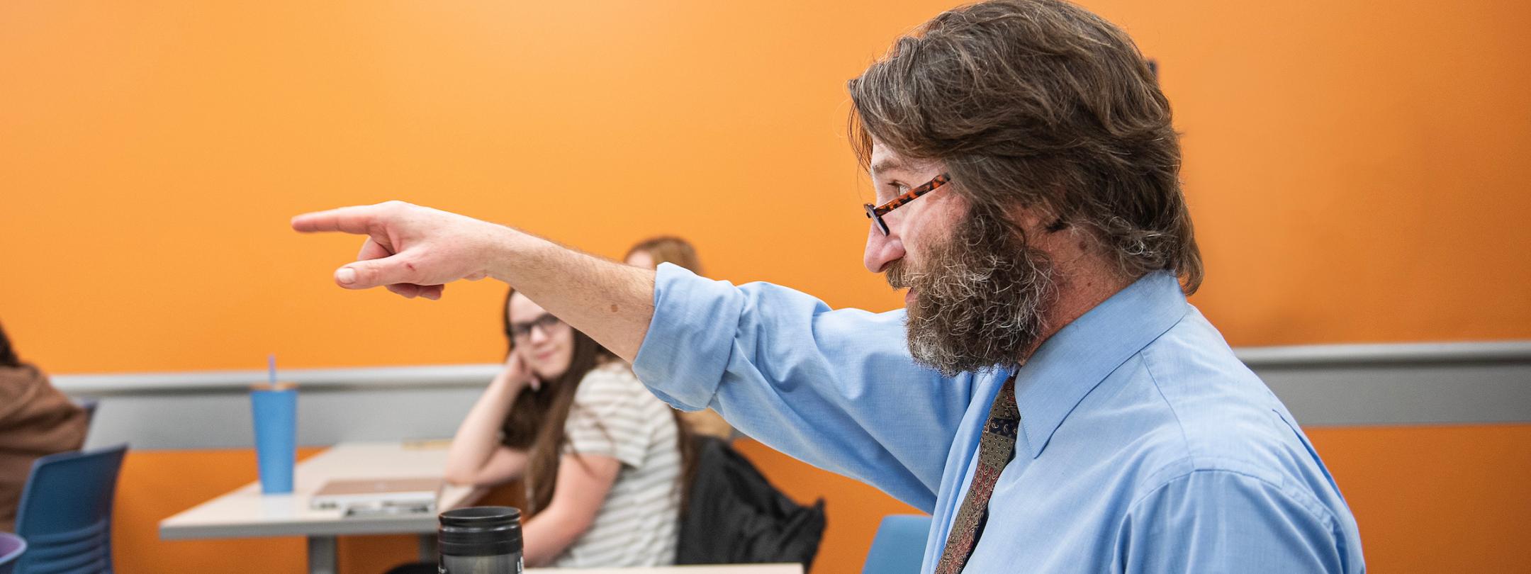 Professor Schuster teaching in a history class.