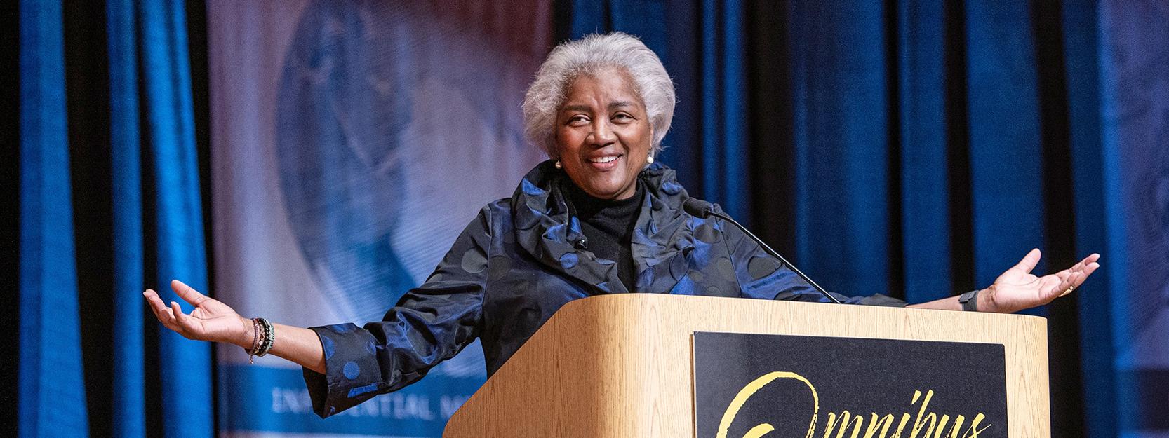 Donna Brazile is speaking onstage in the Auer Performance Hall