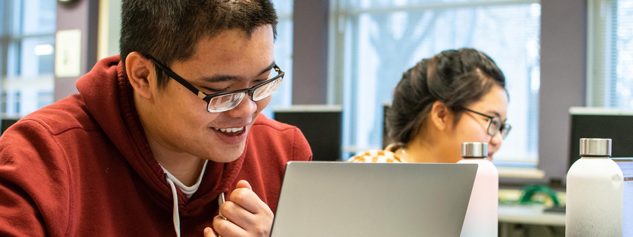 Students working on assignments in the tutoring center.