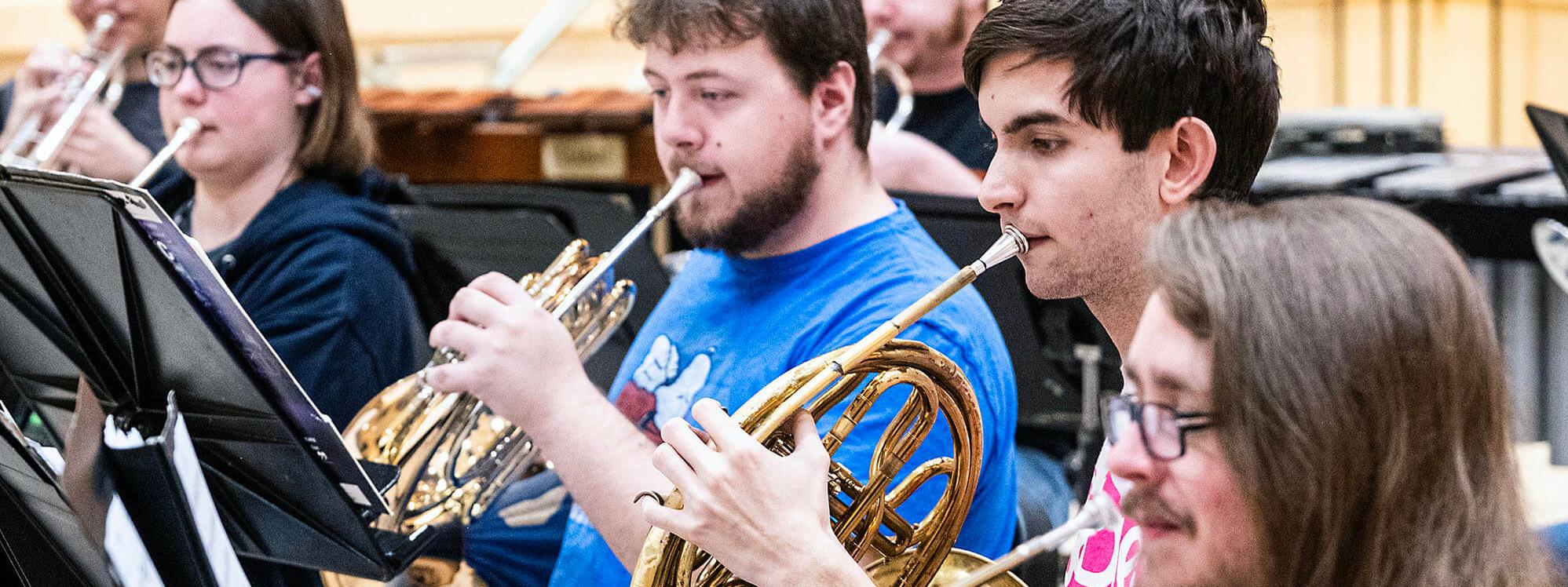 French horn section of the PFW Symphonic Wind Ensemble