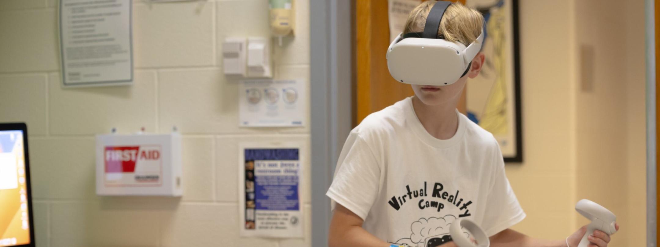 A student with a virtual reality visor