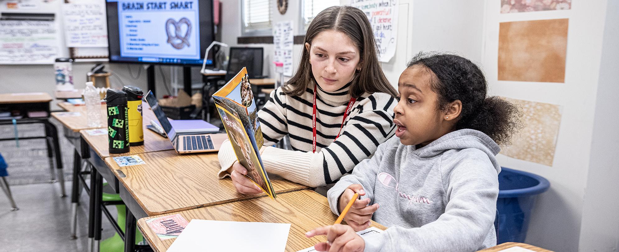 PFW elementary education major on a student-teaching visit to a local school.