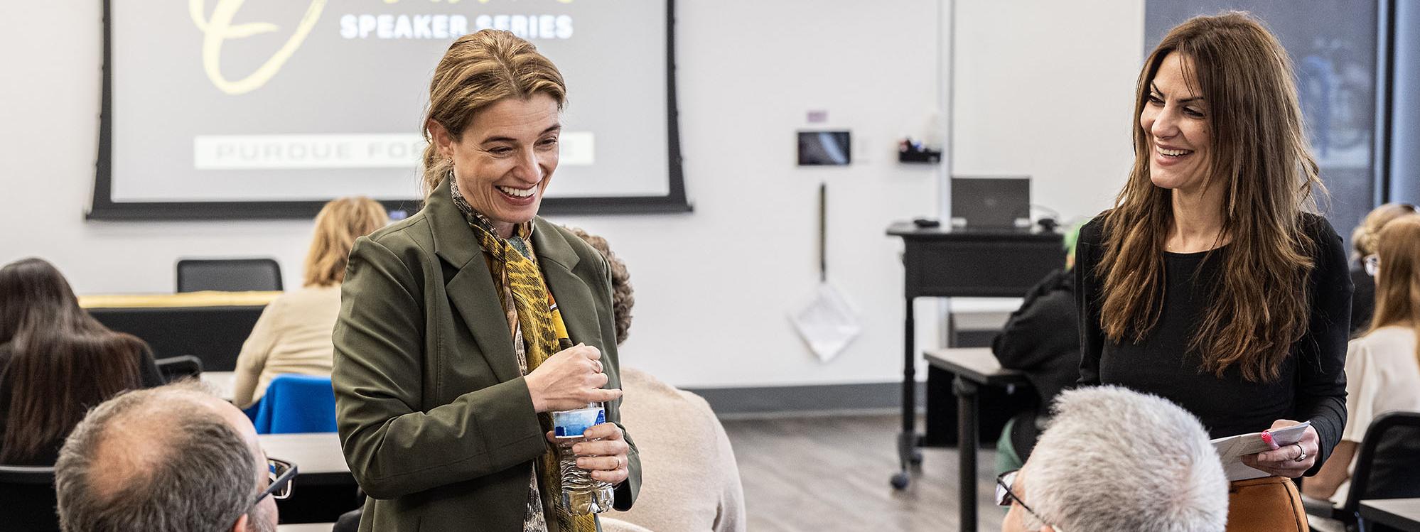 Pati Jinich is chatting with professors