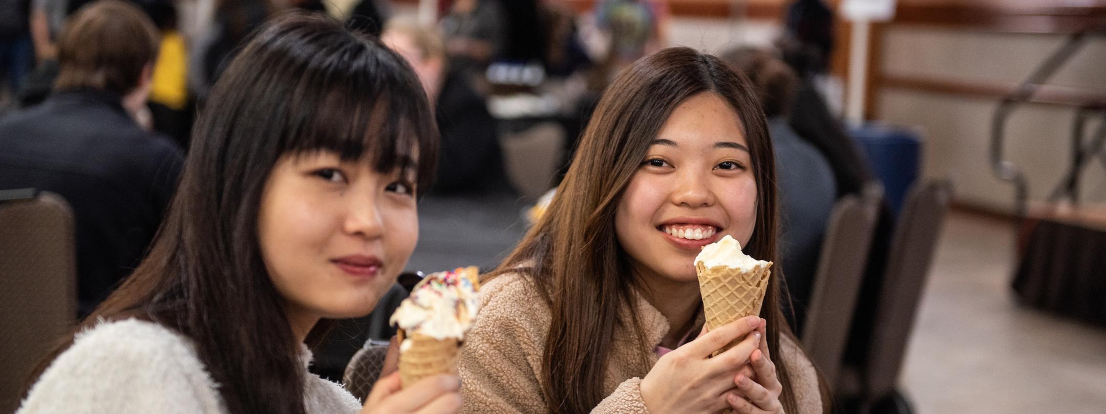 Students enjoying ice cream together.