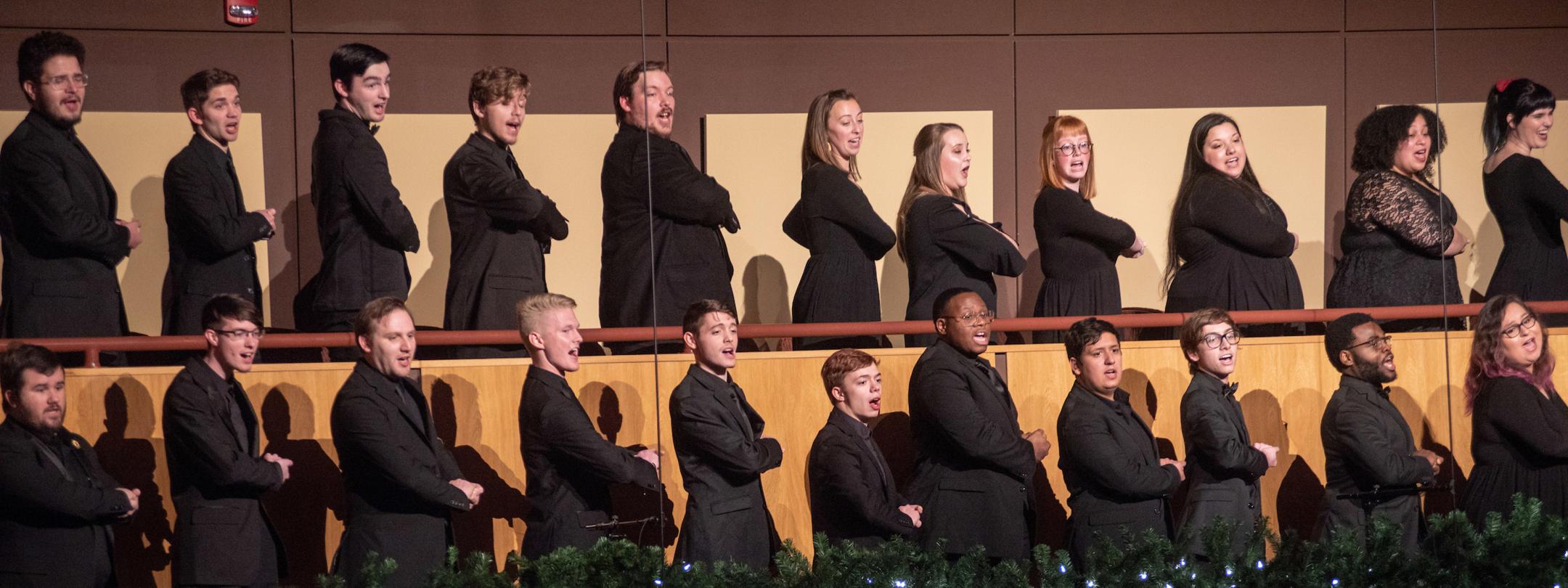 Choral students perform in the holiday concert.