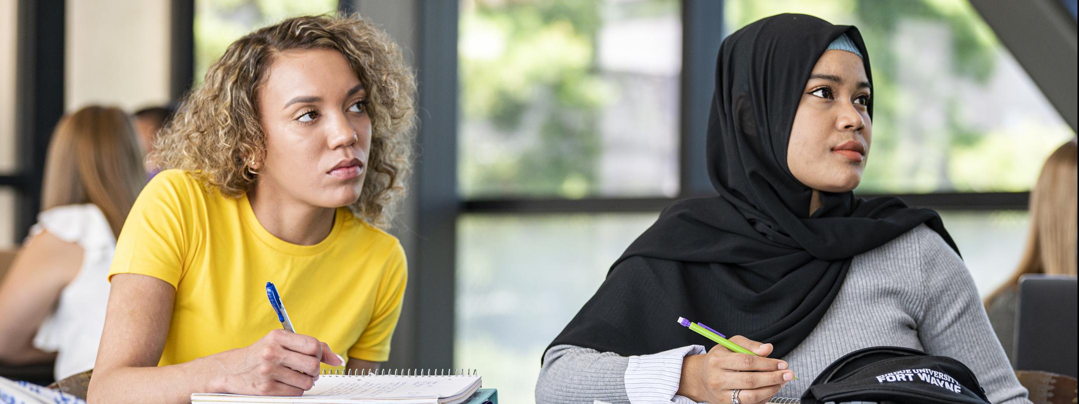 Student listening to lecture.