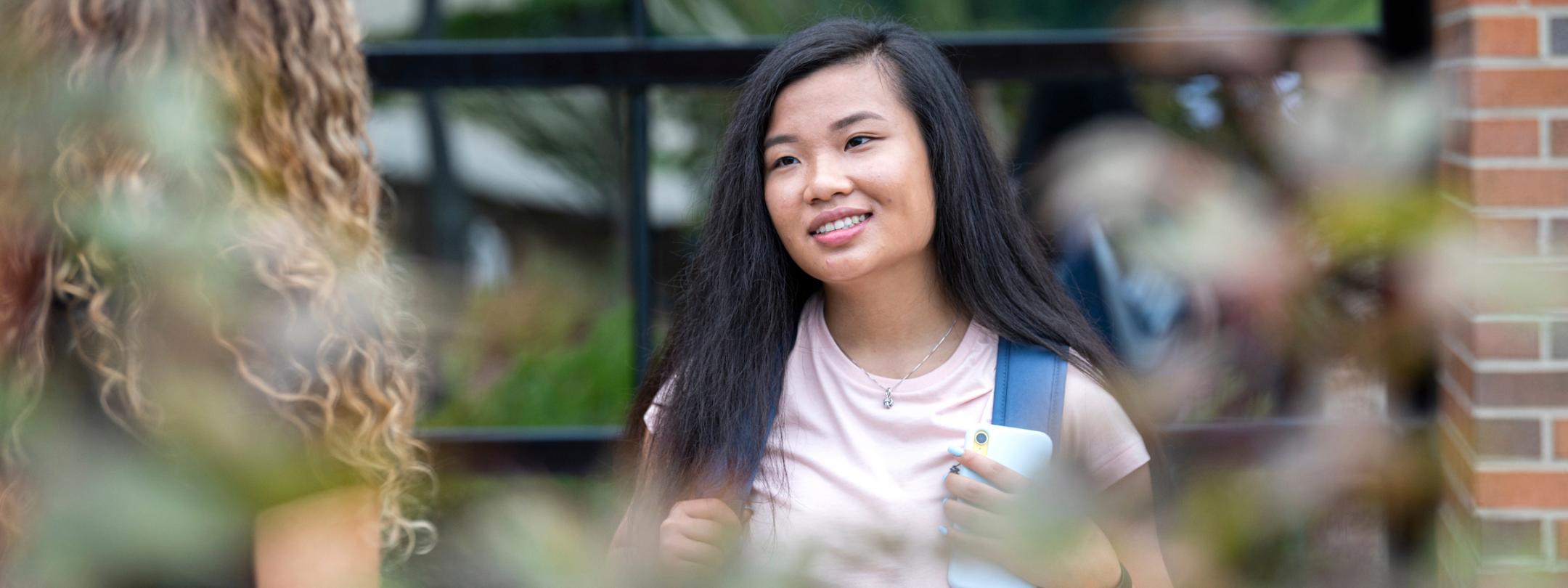 Female students outside of Walb Union