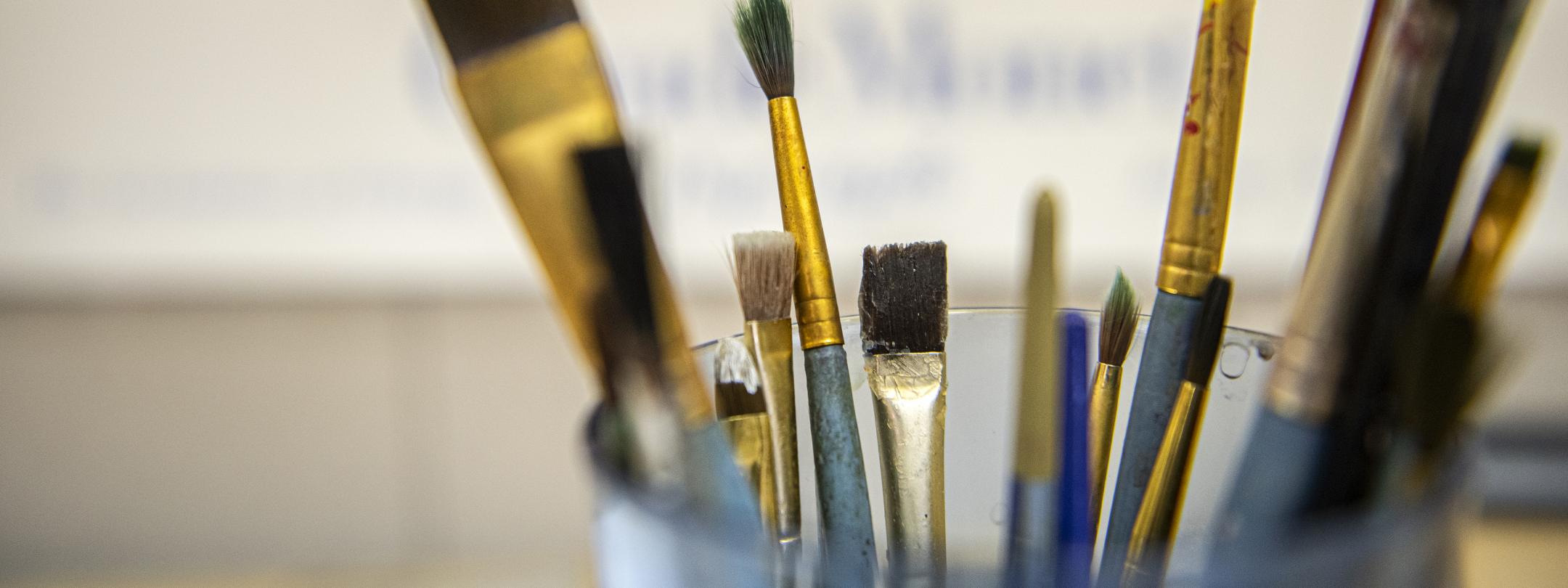 A close up of paint brushes.