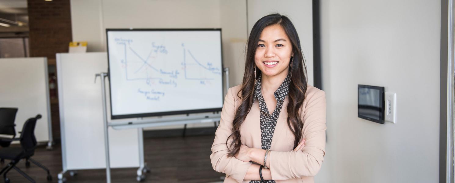 Female business student posing indoors.