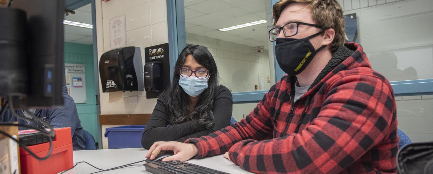 Students working in ECE lab.