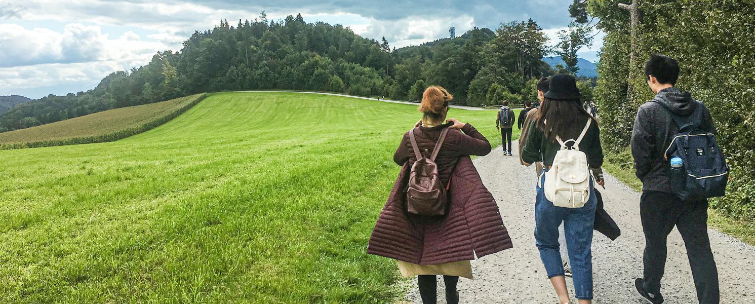 Students on a study abroad trip taking a walk.