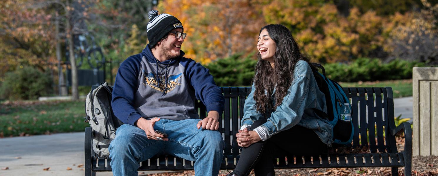 Students sitting on a bench