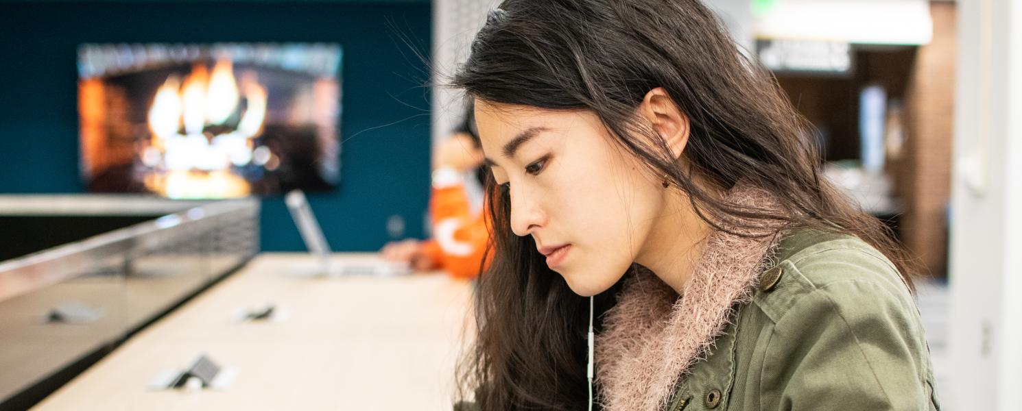 Student studying her class notes.