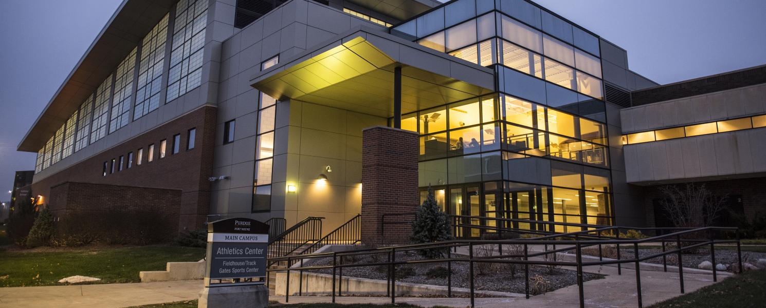 Athletics Center at dusk on campus.