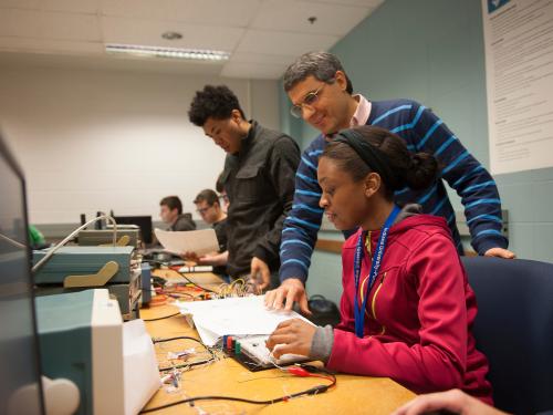 Professor helping student