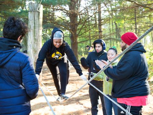 Students on ropes course