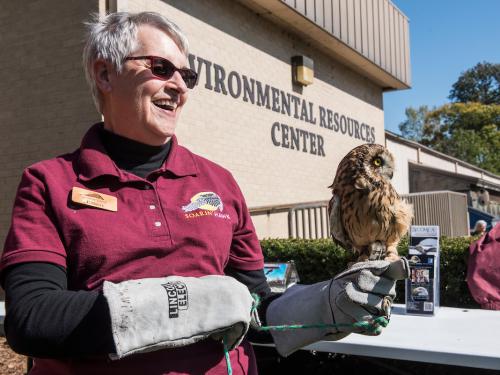 Lady holding an owl