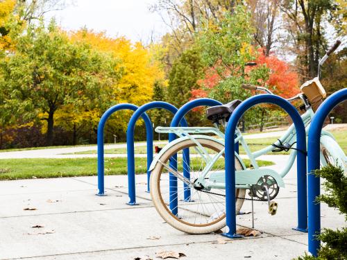 Bike in bike rack on campus.