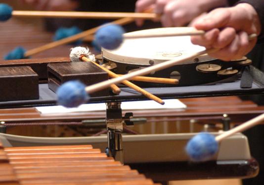 Close up photo playing the marimba