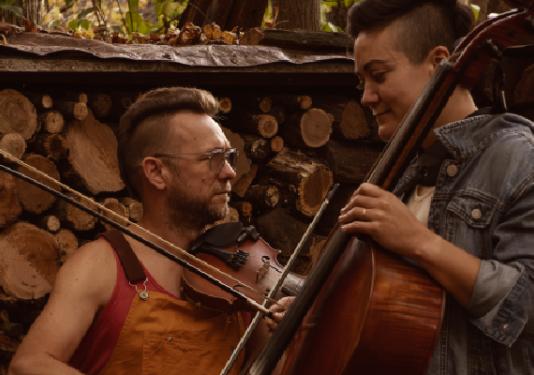 two men playing cello and violin