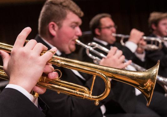 trumpet players performing