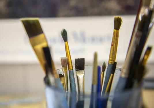 A close up of paint brushes.