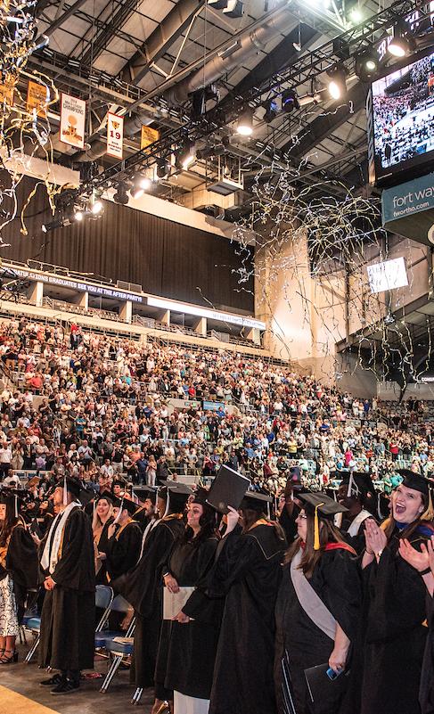 Students celebrating during the 2023 Commencement.