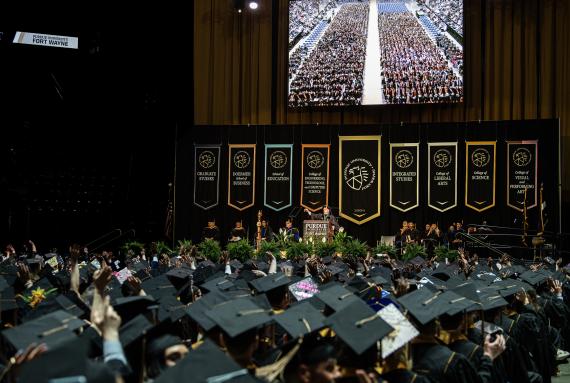 Graduating students in cap and gowns.