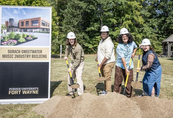 Ceremonial dig at the Surack-Sweetwater Music Industry Building groundbreaking.