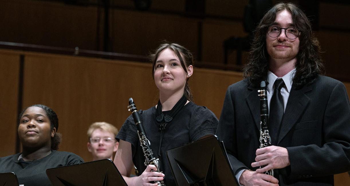 Clarinets take a bow at a Symphonic Wind Ensemble concert.