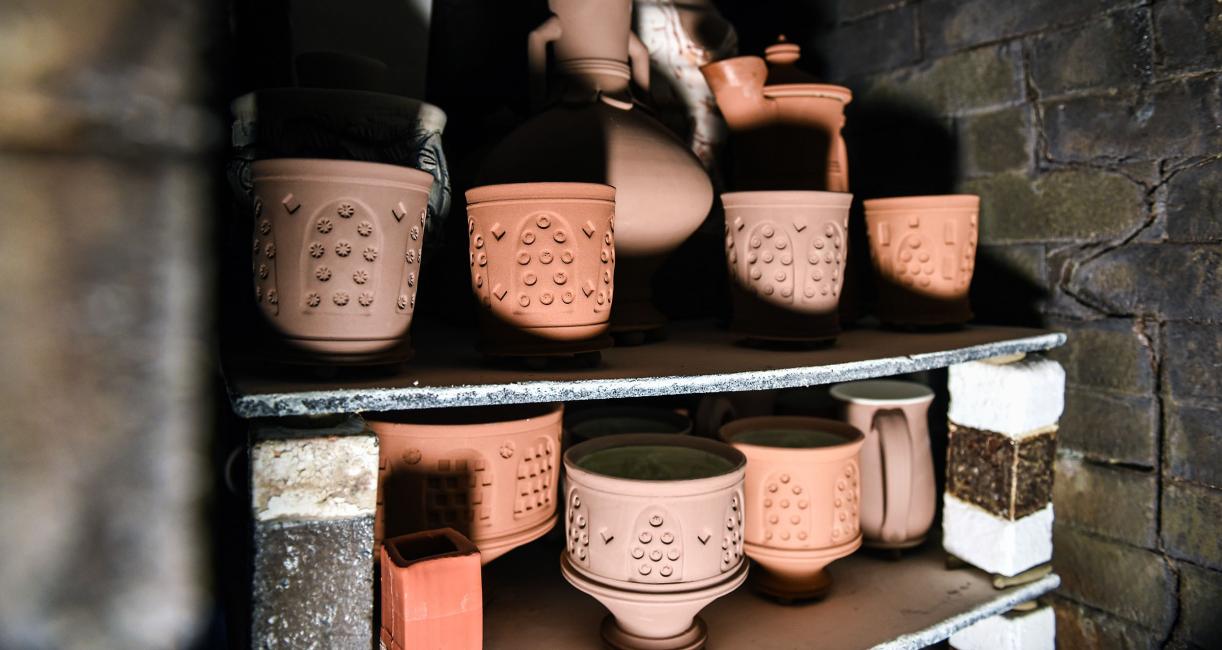 Clay pottery after it has been loaded into the kiln