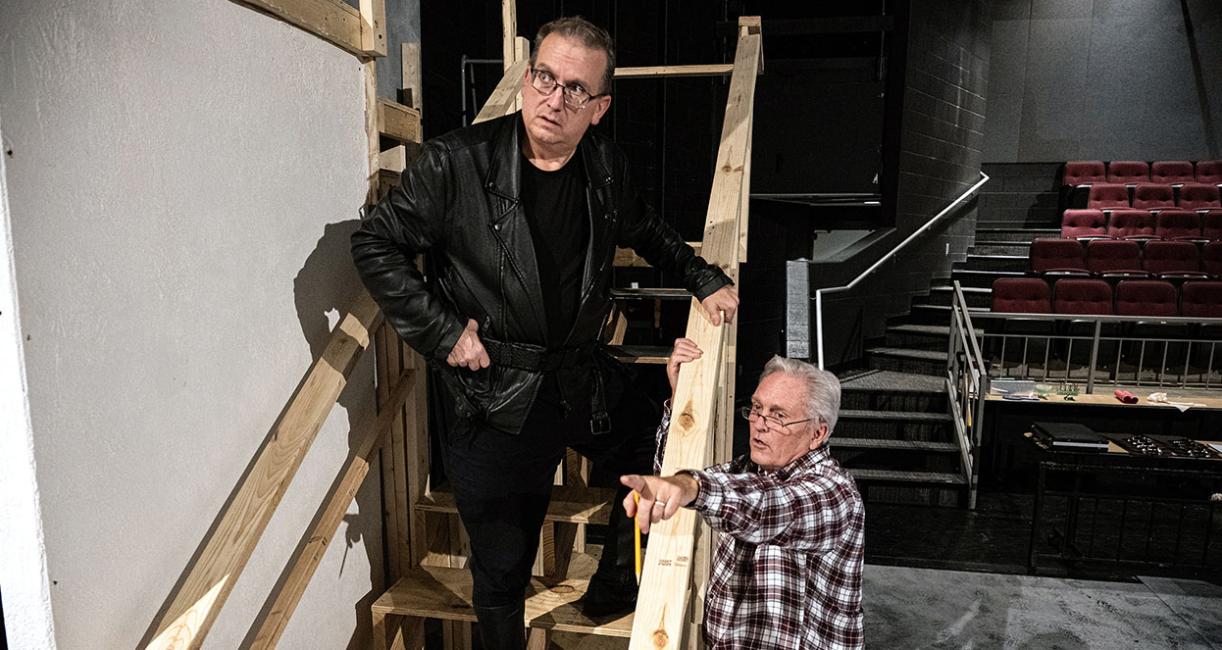 Jeff Casazza and John O'Connell are onstage in Williams Theatre at Purdue Fort Wayne.