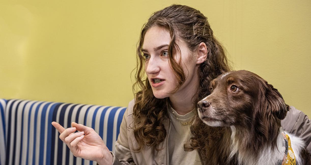 Emily Wentland and her therapy dog, Gunner.