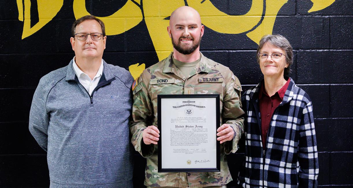 Parents Joe and Patty Bond and their son Tom, who received the rank of Lieutenant at a commissioning ceremony on December 18.