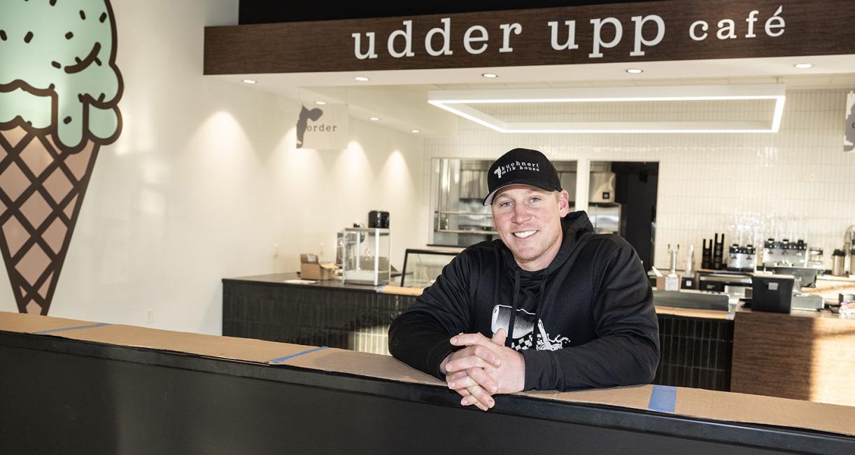 Andrew Kuehnert is behind the counter at Kuehnert Dairy Farms.