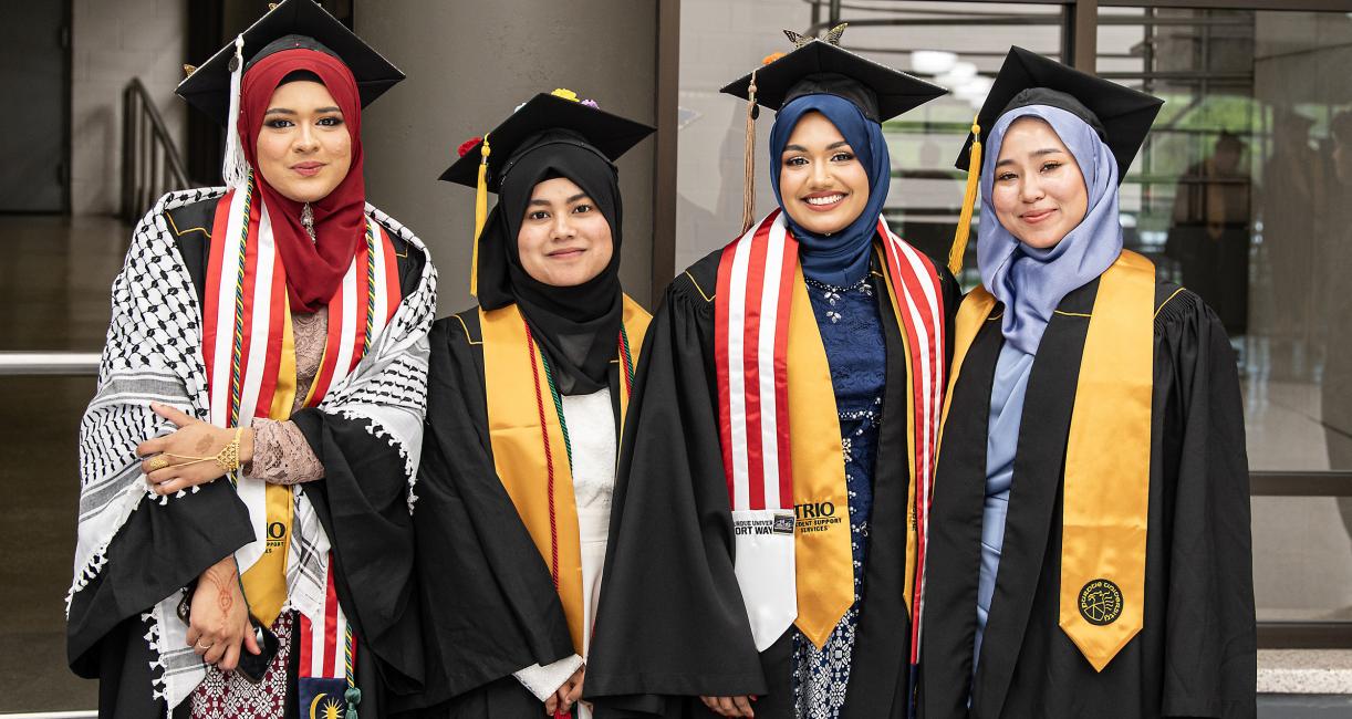 Graduating students in caps and gowns.