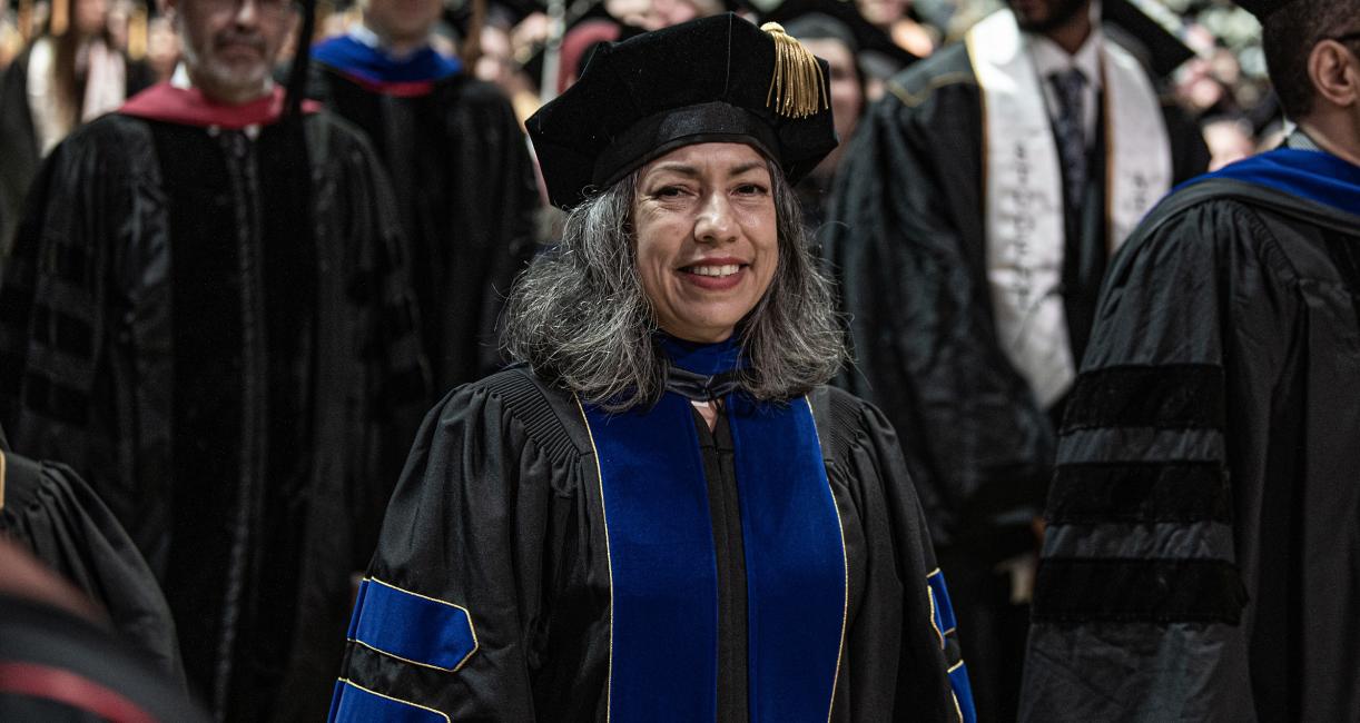 Janet Badia in regalia at commencement.