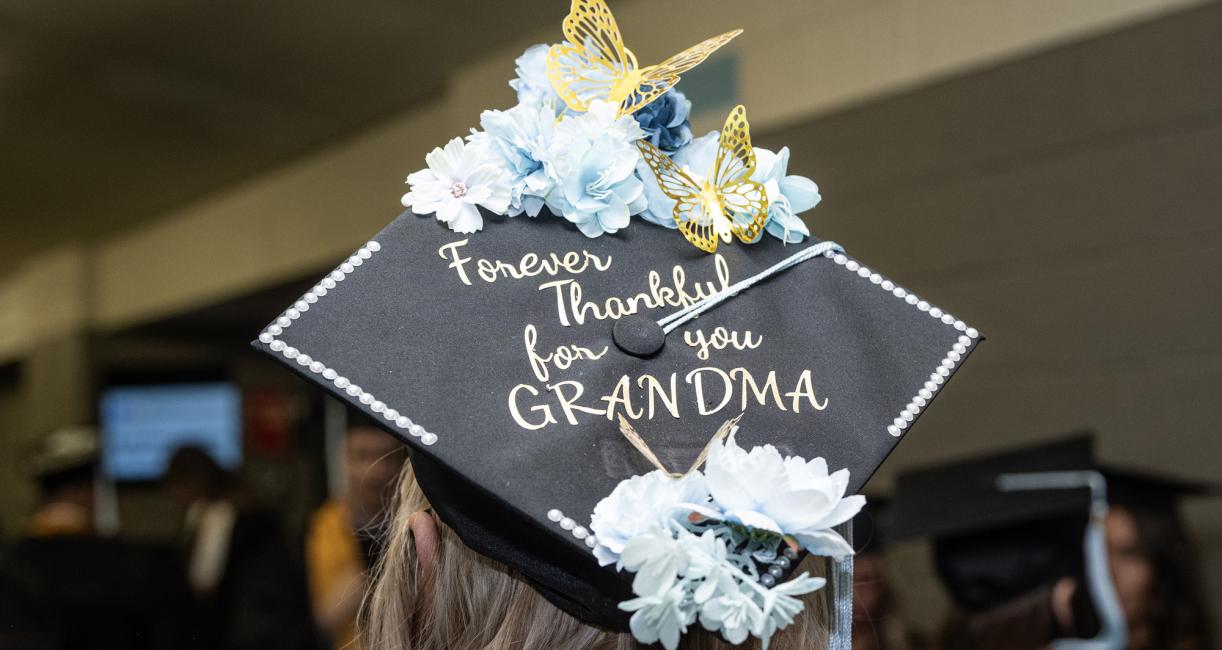 Decorated graduation cap with flowers.