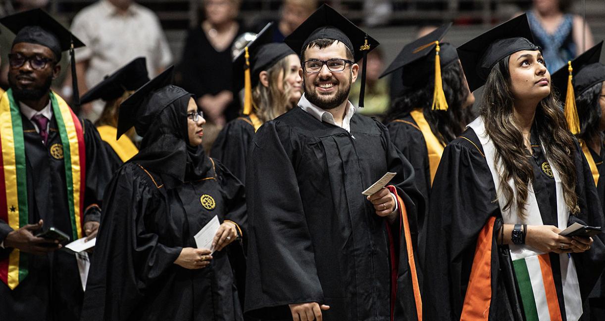 Smiling students at commencement