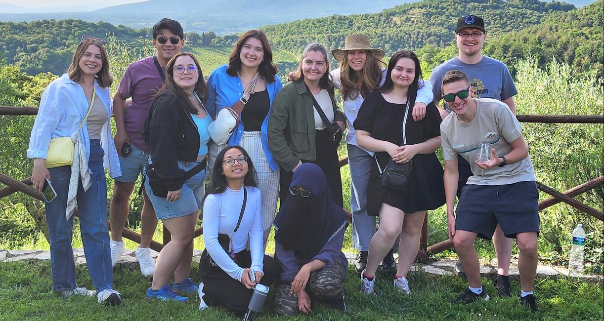 Students outside with mountains in the background