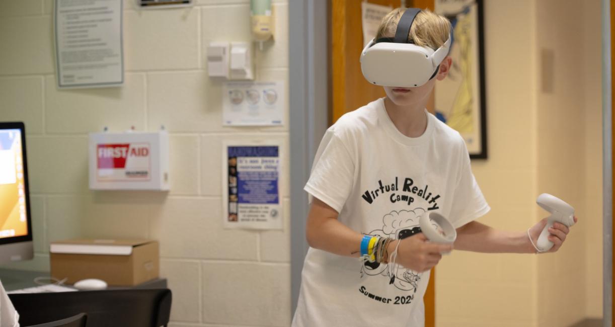 A student with a virtual reality visor