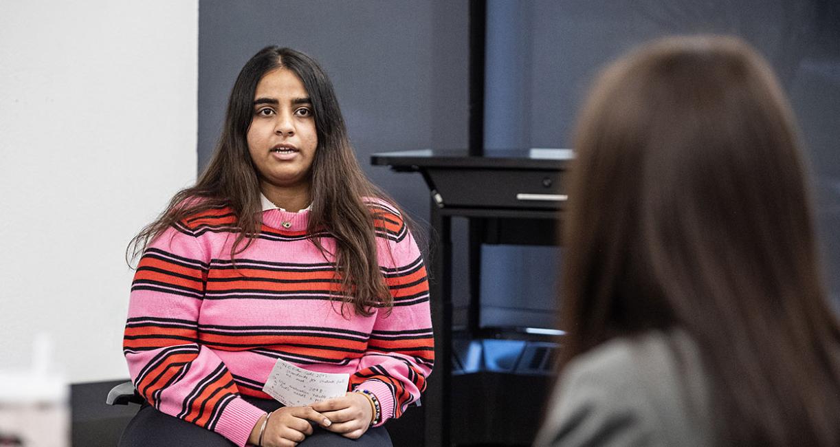 A student is giving testimony at a mock trial