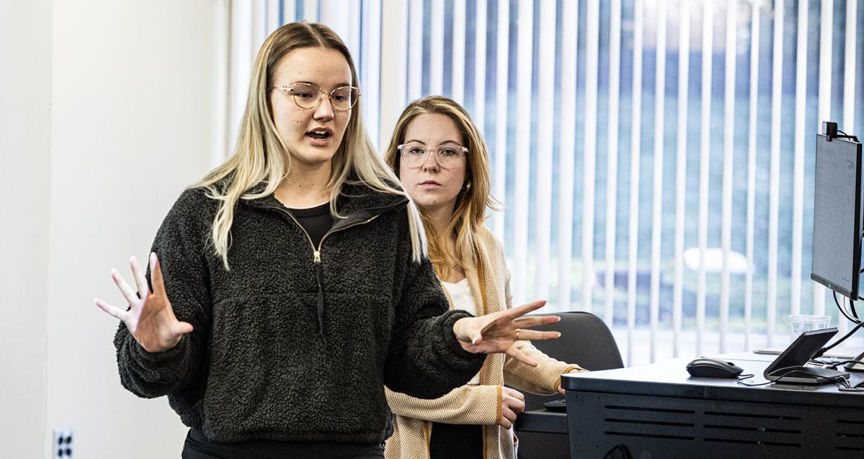 A student is making a business pitch